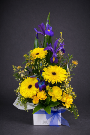 Vibrant Floral Centerpiece with Blue Ribbon –