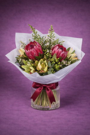Vibrant Protea Bouquet in Elegant Vase –